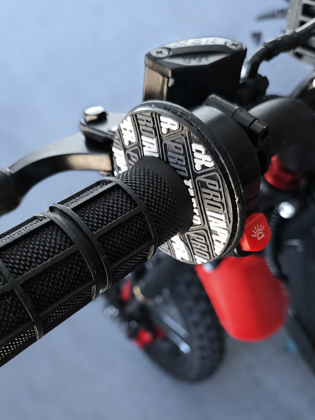 Step-by-step view showing how to slide and lock Velterra grips onto e-bike handlebars.