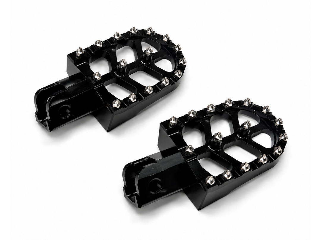 Heavy-duty aluminum e-moto footpegs with high-grip teeth for Surron and Talaria.