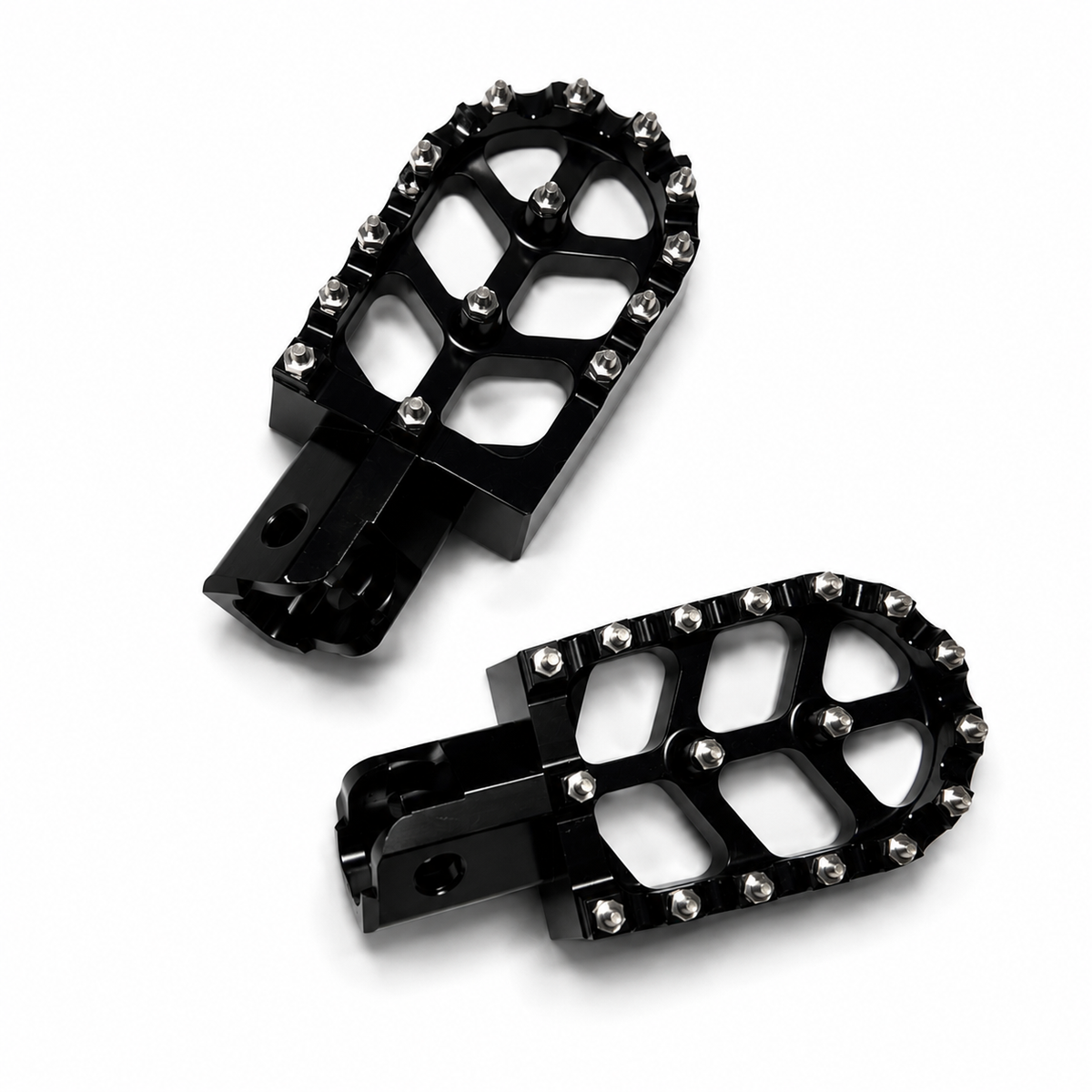 Detailed view of aggressive steel grip teeth on Velterra aftermarket footpegs.